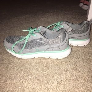 Teal and white sneakers